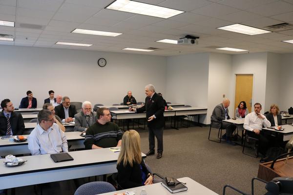 Gheorghe answers participants' questions at the March event.