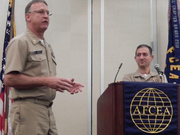 Cmdr. Vanderlip (l) introduces guest speaker Capt. Guzzo in December.