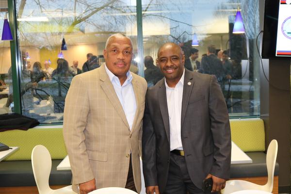 Jeffrey Smith (l), business development manager, Virginia Beach Economic Development, and Joseph Lee, JLGOV LLC, network during the small business event in February.