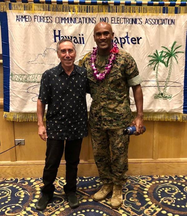 At the February meeting, Chapter President Jeff Bloom (l) poses for a photo with guest speaker Col. Joseph Delaney, USMC, assistant chief of staff, Information Environment Directorate, G-6, U.S. Marine Forces Pacific.