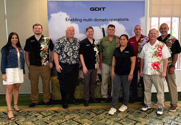 The GDIT team poses for a photo during the June event.