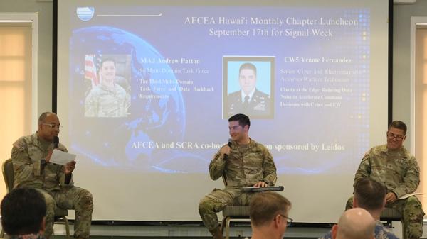 Pictured (l-r) are CW5 Robert Scott, Maj. Andrew Patton and CW5 Yrume Fernandez, speaking at the September luncheon.