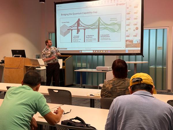 A presenter from MANTECH discusses bridging the quantum capability gap during the May event.