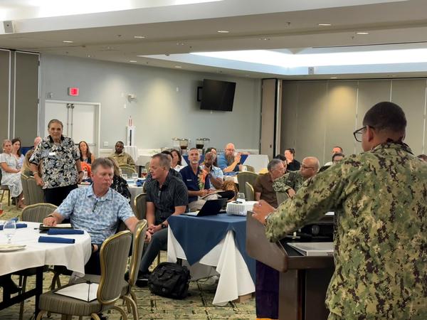 The audience listens to Taylor's August discussion on modern warfighting and adopting innovation at commercial speed.