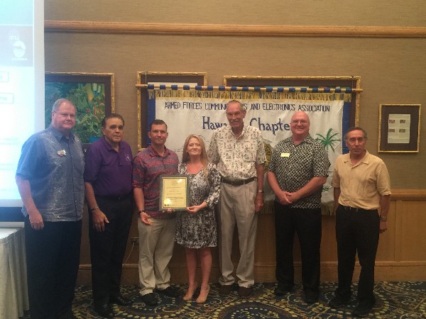 Jen Ing (c) accepts the chapter's Life Membership Award on behalf of her father, Mel, in October. Surrounding Ing is the chapter's board of directors, including (l-r) Jack Murphy, Cory Lindo, Jim Muller, Dick Macke, Ed Ryglewicz and Jeff Bloom.