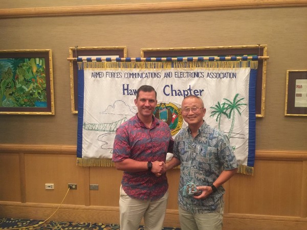 Chapter President Jim Muller (l) thanks Vern Miyagi, administrator of the Hawaii Emergency Management Agency, guest speaker for the chapter in October.