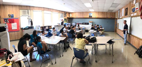 Bob Monroe, ISECOM, teaches students at Saint Louis School, Honolulu, Hawaii, about cyber awareness and good hygiene at the July event.