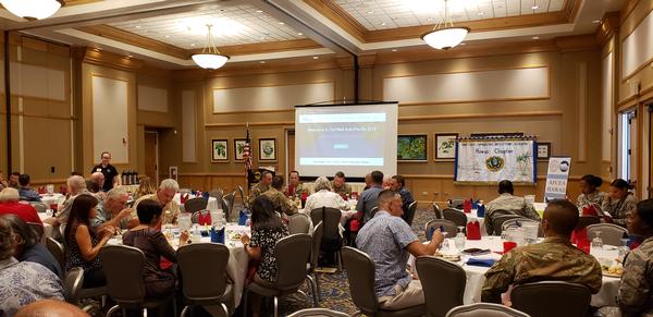 Attendees of the September event prepare to hear the guest speaker's presentation.