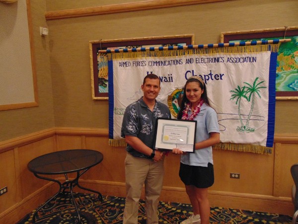 Muller presents Erica Lee with her Student of the Month certificate at the luncheon in September. 