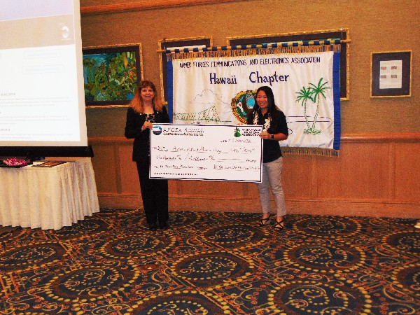 Donna Russell (l), namesake of the teacher scholarship Fung received, congratulates Fung on her award in October.