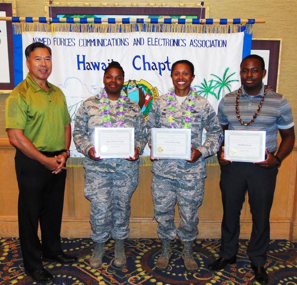 Receiving recognition from Fong at the August luncheon are (l-r) Staff Sgt. Jaleesa Woods, USAF, Young AFCEAN of the Month; Lt. Col. Mary King, USAF, Senior Government Leader; and Joseph Lee, CEO Configure LLC, AFCEAN of the Month.