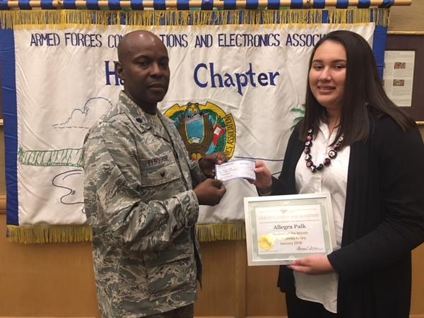 Col. Elbourne presents a certificate and a check to the chapter's January Student of the Month, Allegra Palk of St Andrew's Priory School.