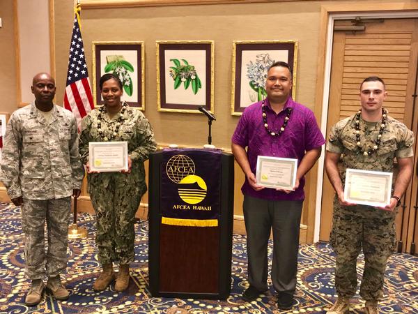 Col. Elbourne (l) recognizes chapter award winners in September, including (from 2nd from l) Chief Warrant Officer 4 Vanderla Akaka, USN, Opeta O'Brien and Sgt. Andrew Pascuzzi, USMC.