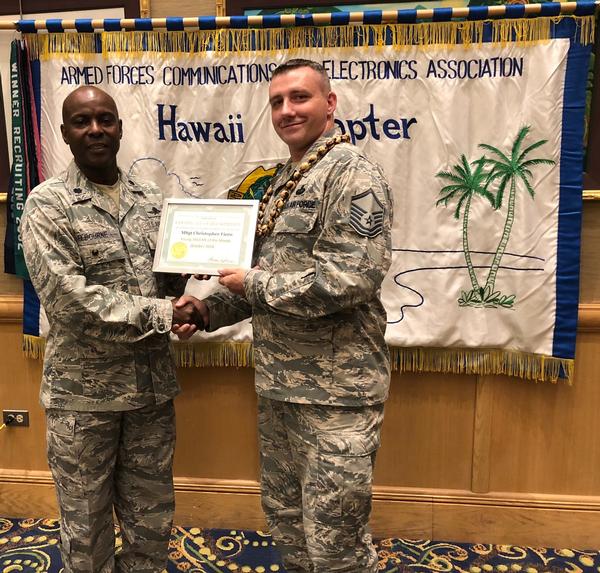 Col. Elbourne (l) presents October's Young AFCEAN of the Month Award to Master Sgt. Christopher Fiero, USAF.