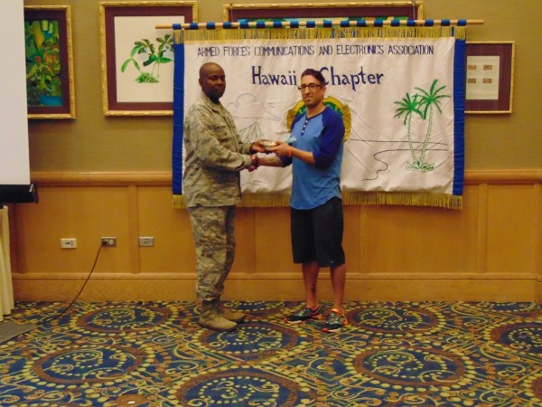 Col. Elbourne thanks August luncheon guest speaker Jason Sewell, co-founder, instructor and curriculum designer for DevLeague.