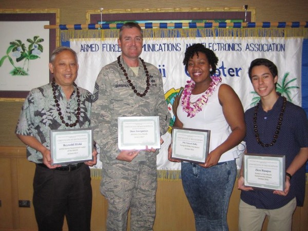 Accepting award certificates from the chapter in January are (l-r) Col. Reynold Hioki, USAF (Ret), senior government leader of the month; Chief Master Sgt. Don Gurganus, USAF, AFCEAN of the month; Petty Officer 1st Class Ermine Bulls, USN, Young AFCEAN of the month; and Zion Basque, student of the month.