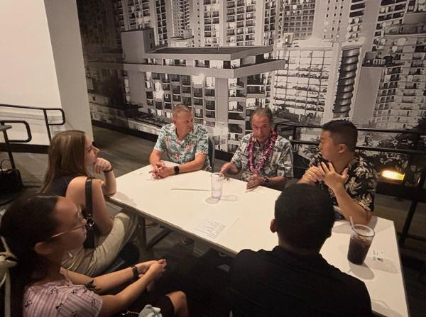 Roy J. Panzarella, director, Hogan Entrepreneurial Leadership Program, Chaminade University of Honolulu (c), mentors at the Emerging Leaders event in March.