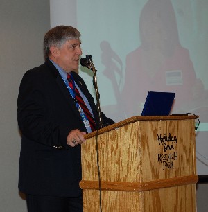 Vic Budura, chapter president, opens the January meeting.