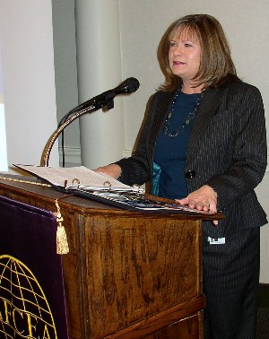 At the November meeting, Connie Wallace, chapter vice president for programs, calls for volunteers for the 2009 Joint Integrated Air and Missile Defense Summit.