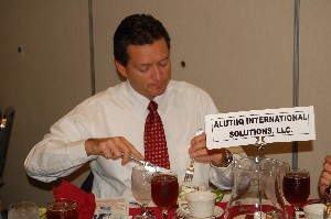 Luncheon guest Steve Brolsma, Alutiiq International Solutions LLC, dives right in at the November meeting.
