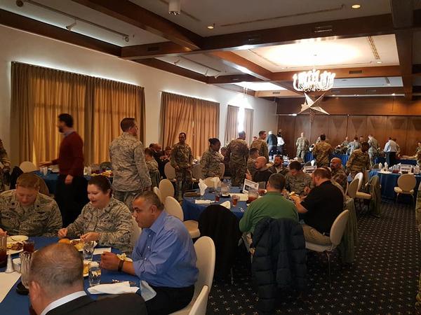 Chapter members enjoy community and food at the December luncheon.