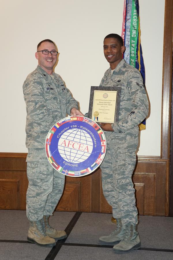 Chapter Vice President Lt. Col. Steven Brummitt, USAF, commander, 86th Communications Squadron (l), presents Airman 1st Class Mekhi Witherspoon, USAF, 86th Communications Squadron, the chapter's Young AFCEAN Emerging Leader Award at the March membership luncheon.