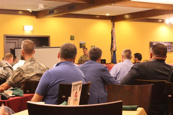 Col. William Galbraith, USA, speaks about the relationship between government and industry at the chapter's July meeting.