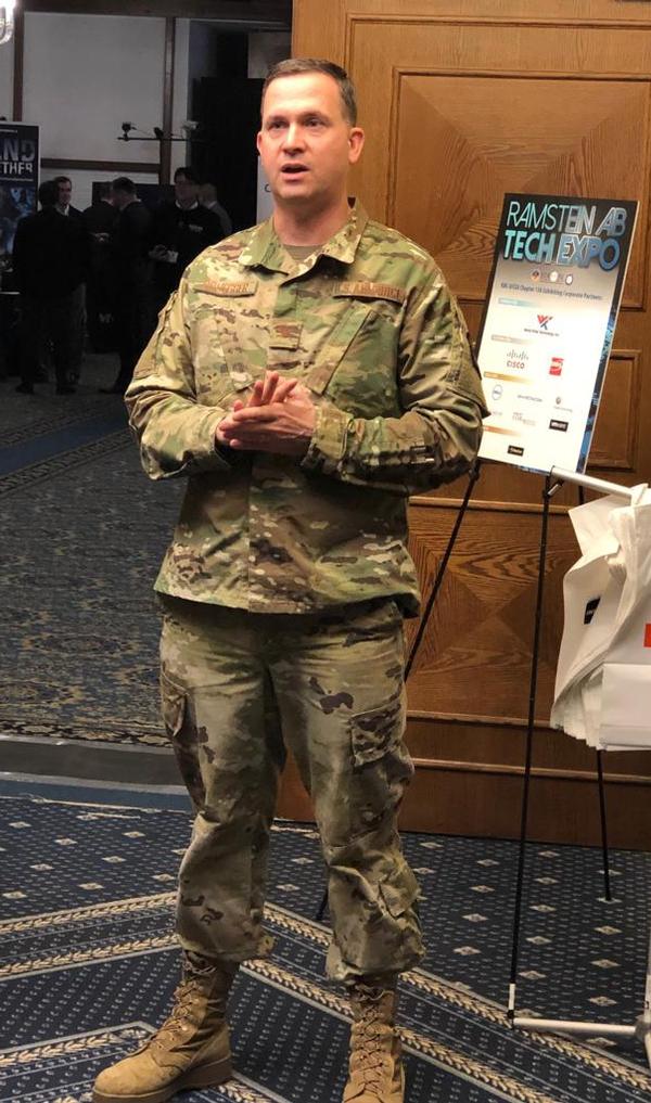 In February, Col. Neal Bruegger, USAF, president, leads the tour for the Winter Tech Expo.