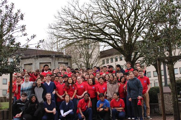 Students pose for a group photo in front of the Berlin Wall Memorial at the SkillsUSA Competition in March.