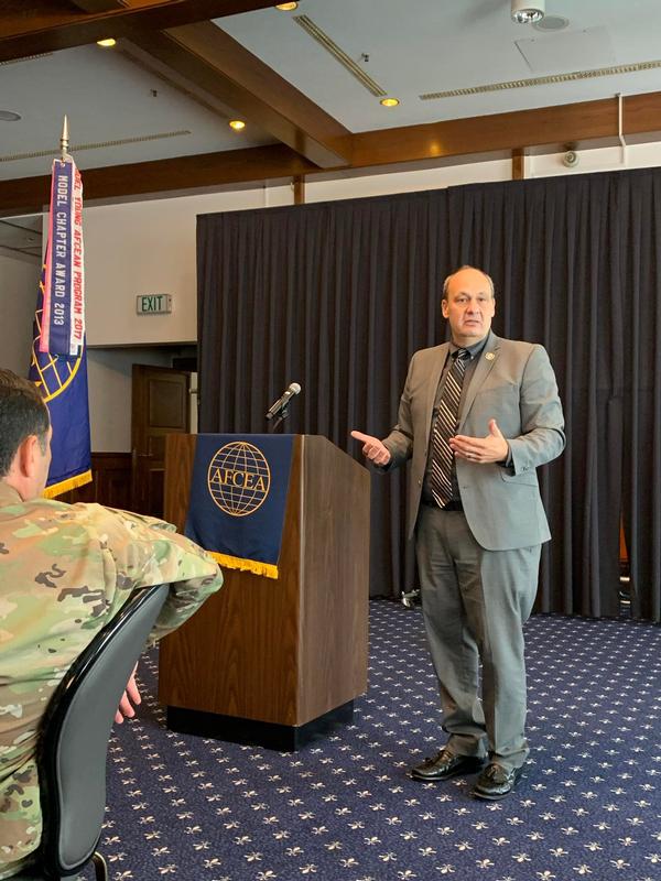 Danny Holtzman, Senior Executive Service, cyber technical director, U.S. Air Force, presents at the chapter's October event.