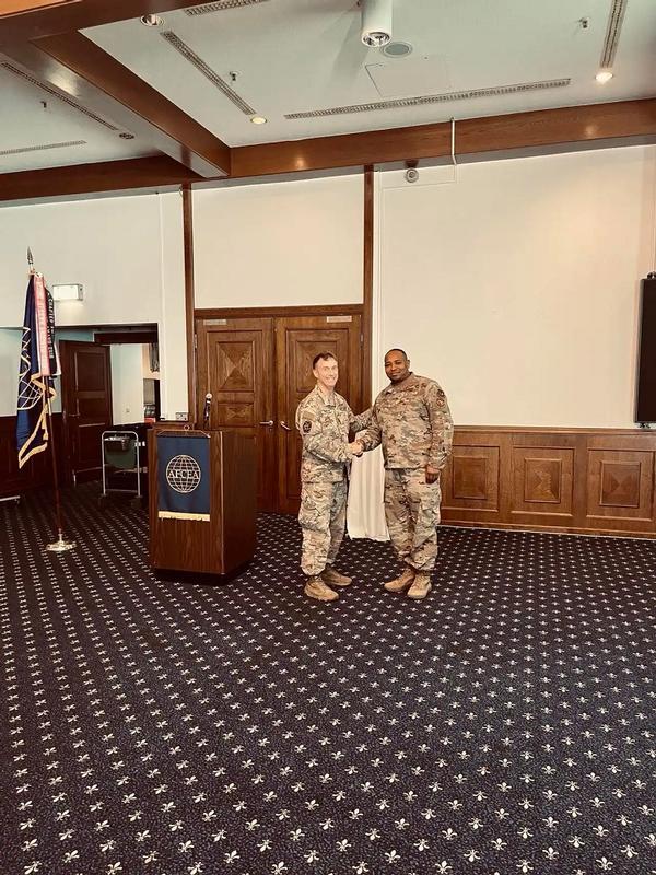 In September, the chapter hosts Master Sgt. Darryl Payton Jr., USAF, command spectrum manager for U.S. Air Forces in Europe (USAFE)-Air Forces Africa (AFAFRICA), Ramstein Air Base, Germany (r), for its monthly luncheon seminar.