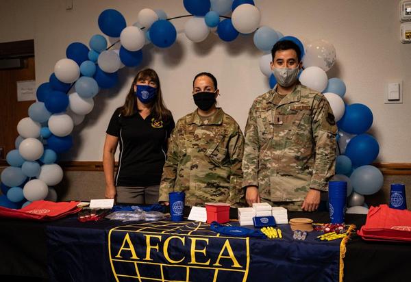 Chapter officers (l-r) Christina Whatley, treasurer, Master Sgt. Danielle Haynes, USAF, incoming executive vice president, and 1st Lt. Luis Del Castillo, USAF, outgoing executive vice president, man the AFCEA booth during the Tech Show event in October.