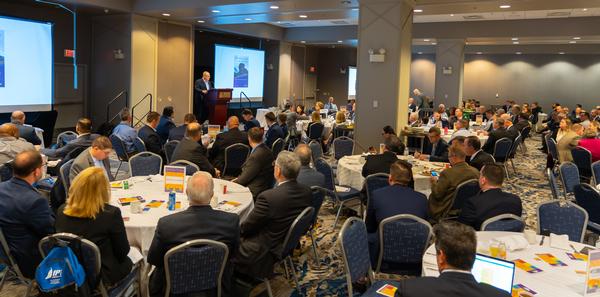 Troy Blanchard, Google Cloud account manager, acts as master of ceremonies at the chapter's 10th annual Gold Breakfast fundraiser to support STEM scholarships in March.