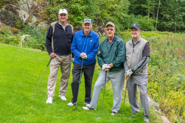 First-place winners in the September golf tournament's second flight are (l-r) Connie Gath and Tom, JC, and Paul Corcoran.