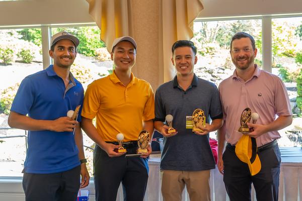 Winners of the 1st Flight and the Alan M. Hart Mentorship Flight are (l-r) 1st Lt. Rudra Patel, USAF, 1st Lt. Nick Orfitelli, USAF, 1st Lt. Hansel Surhali, USAF, and Rory Goosen.