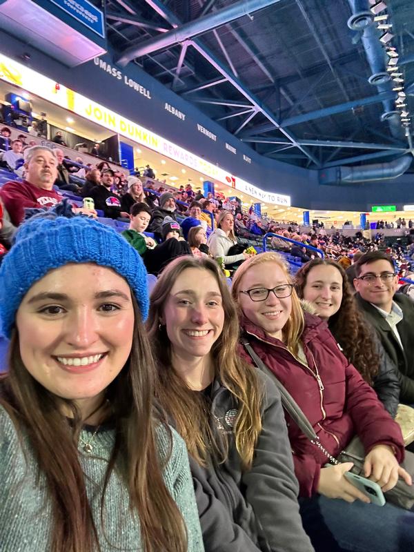 The chapter's Emerging Leaders bundle up for the game in January.