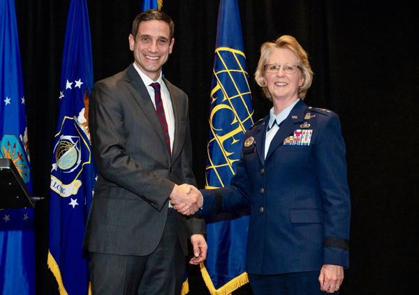 In February, Chapter President Mike McGinley thanks Lt. Gen. Donna Shipton, commander, Air Force Life Cycle Management Center, Wright-Patterson Air Force Base, Ohio.