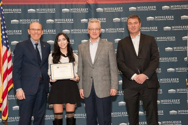 Middlesex Community College student Melissa Allard receives one of three Thomas O'Mahony awards distributed in March by Barrette (2nd from right), Chisholm (r) and Mabry. 