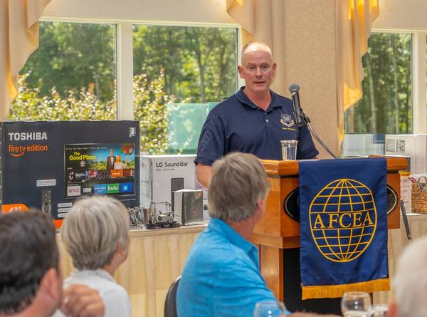 Maj. Gen. Michael Schmidt, USAF, program executive officer, Command, Control, Communications, Intelligence and Networks (C3I and N), a huge supporter of the chapter's STEM initiatives, addresses golfers and thanks the chapter for sponsoring such a great event during the post-tournament luncheon.  