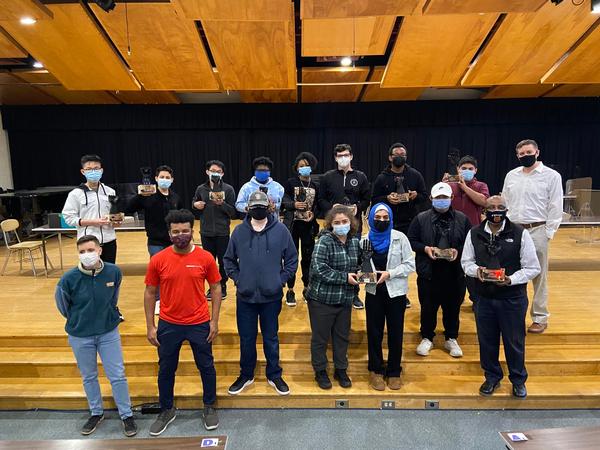 In April, students and teachers from John D. O'Bryant High School of Mathematics and Science and Madison Park Technical Vocational High School proudly display the results of their robotic hand builds during RoboWeek 2021. 