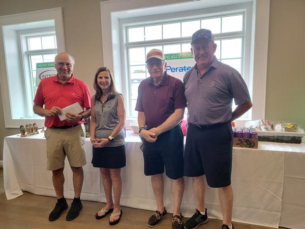 First place winners for 2nd Flight with a score of 68, (l-r) Arthur D'Angelo, Sharon Wall, Tony Guerra and Fran Wall pose for group photo at the chapter's annual Elmer J. Fuller golf tournament in June.