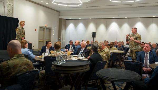Shipton engages attendees in a Q and A session at the February luncheon.