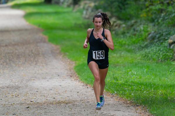 This year's overall women's winner of the Annual YAC 5K STEM fun run,  Gina D'Addario, finishes with a time of 19:31.