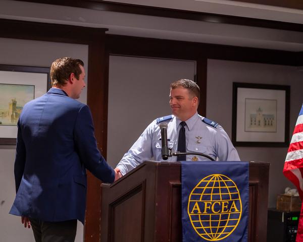 Hamilton (l) thanks Col. King for his informative presentation about the future of Air Force IT at the December breakfast meeting. 