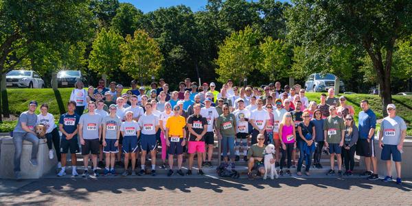 At the AFCEA LEXCON STEM 5K in September, runners and supporters pose for a photo.