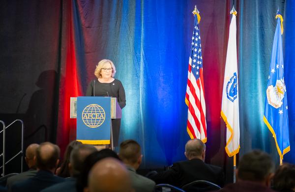 Chapter President Erin Donlan addresses the audience on day three of the March symposium.