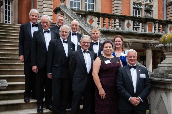 The chapter's VIP guests pose for a photo with Maj. Gen. Erich Staudacher, GEAF (Ret.), general manager, AFCEA Europe, at the June celebration.