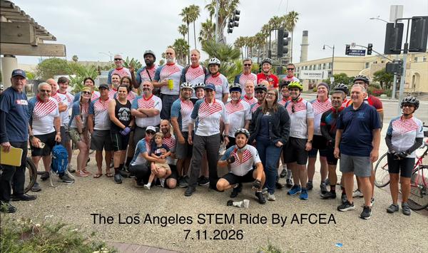 In July, riders pose for a photo, wearing the unique event jersey celebrating our nation's 250th anniversary.