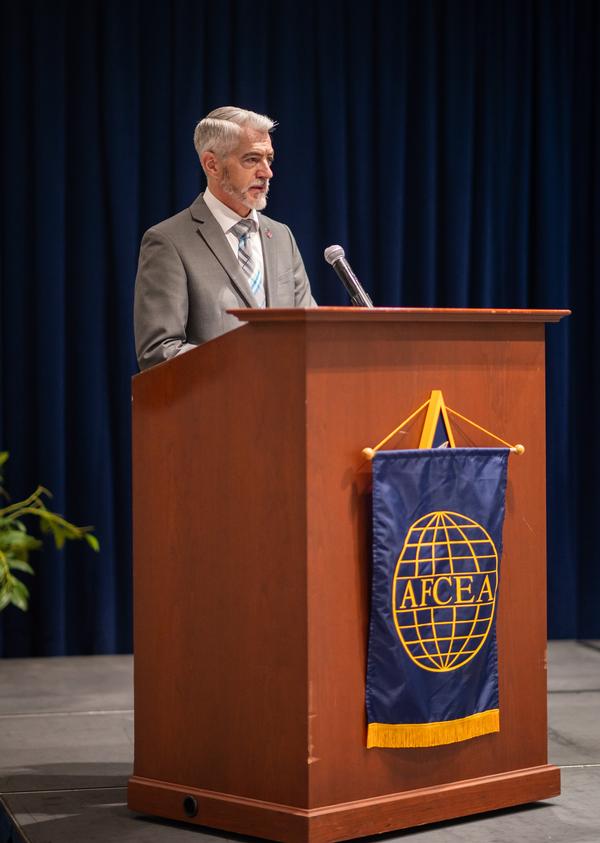 Todd Wiest, chapter president, discusses the award criteria at the September event.