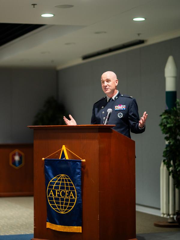 Col. Andrew S. Menschner, USSF, prepares to present the awards during the September event.